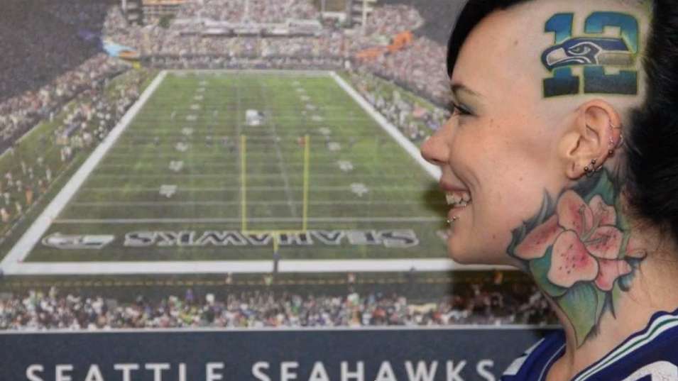 Girl Tattoos Seahawks Logo on Her Head